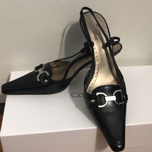 Woman’s black dress heels